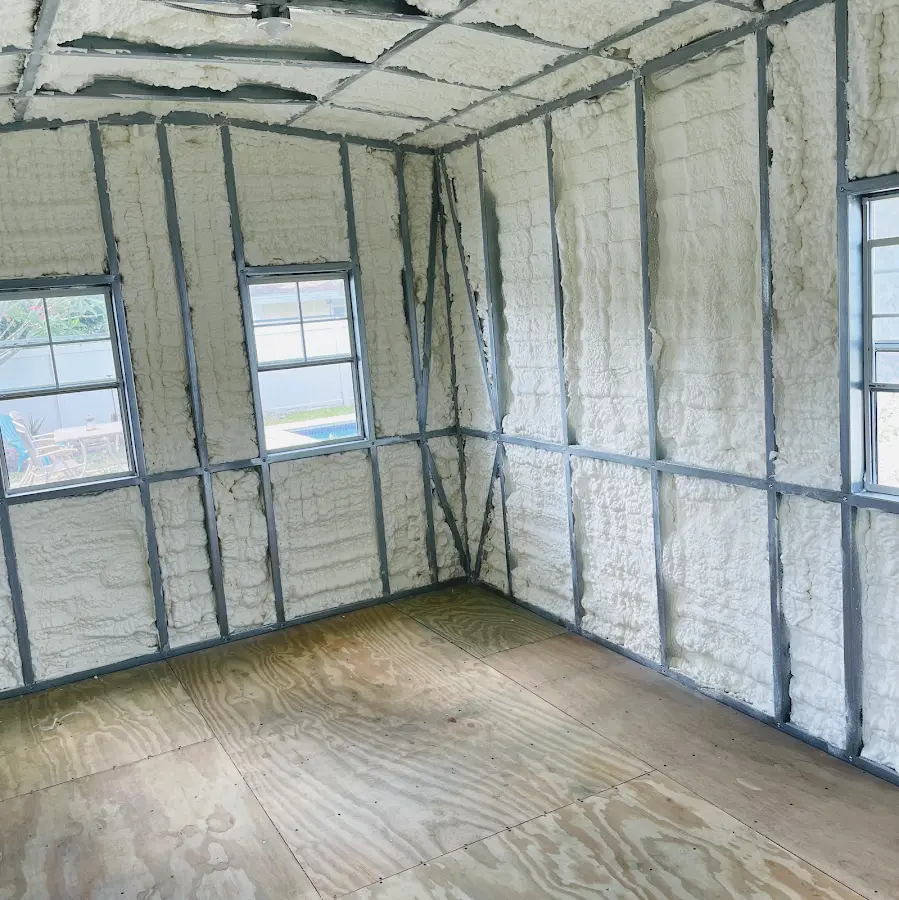 Closed-cell spray foam insulation applied to wall cavities in a residential project in Coral Hills